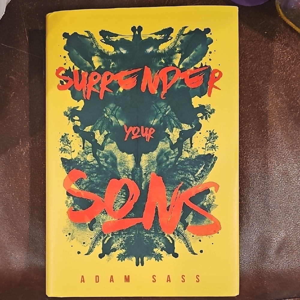 Surrender Your Sons Book - Yellow and Red Cover